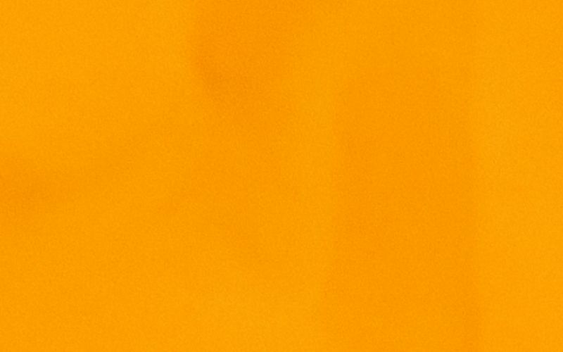 Wallpaper with orange gradient, some shades of orange are lighter, some darker.